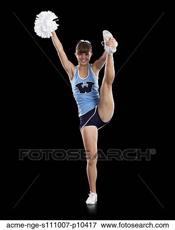 Portrait of teenage cheerleader girl (16-17) holding pom-pom View Large Photo Image Stock Photo - Portrait of teenage cheerleader girl (16-17) holding pom-pom. Fotosearch
