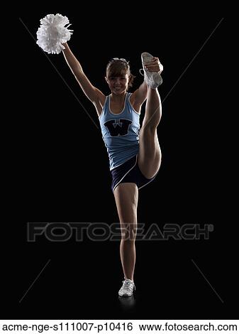 Portrait of teenage cheerleader girl (16-17) holding pom-pom View Large Photo Image Stock Photograph - Portrait of teenage cheerleader girl (16-17) holding pom-pom. Fotosearch