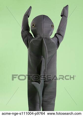 Picture - Rear view of boy (6-7) in shark costume for Halloween. Fotosearch