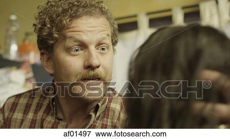 Selective focus blurred view of abusive boyfriend holding girlfriend's head ready to strike in kitchen View Large Photo Image Stock Photo - Selective focus blurred view of abusive boyfriend holding girlfriend's head ready to strike in kitchen. Fotosearch