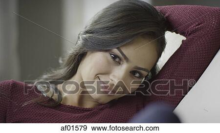Selective focus portrait of smiling woman View Large Photo Image Stock Photo - Selective focus portrait of smiling woman. Fotosearch
