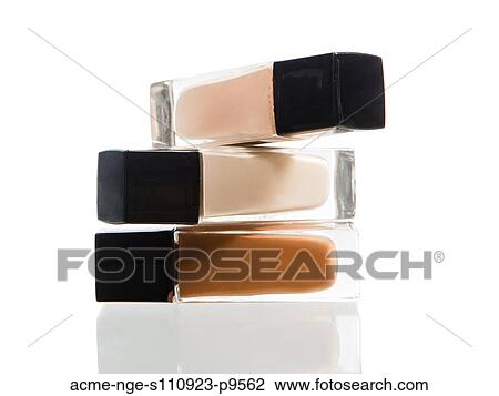 Stacked bottles of foundation View Large Photo Image Stock Image - Stacked bottles of foundation. Fotosearch