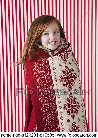 Studio portrait of girl (4-5) wrapped in red blanket View Large Photo Image Stock Photography - Studio portrait of girl (4-5) wrapped in red blanket. Fotosearch