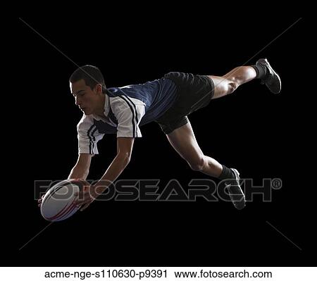Studio portrait of teenage boy (14-15) with rugby ball View Large Photo Image Stock Image - Studio portrait of teenage boy (14-15) with rugby ball. Fotosearch