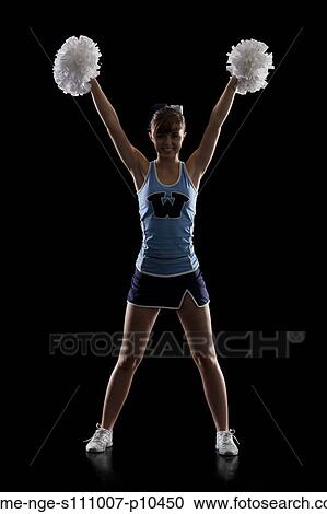 Studio shot of cheerleader (16-17) striking pose View Large Photo Image Stock Image - Studio shot of cheerleader (16-17) striking pose. Fotosearch
