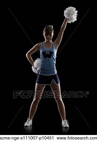 Studio shot of cheerleader (16-17) striking pose View Large Photo Image Stock Image - Studio shot of cheerleader (16-17) striking pose. Fotosearch