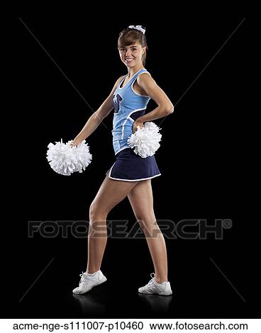 Studio shot of cheerleader (16-17) striking pose View Large Photo Image Stock Image - Studio shot of cheerleader (16-17) striking pose. Fotosearch