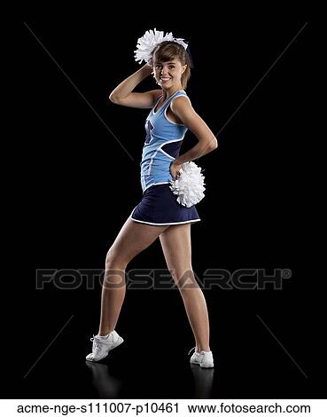 Studio shot of cheerleader (16-17) striking pose View Large Photo Image Stock Image - Studio shot of cheerleader (16-17) striking pose. Fotosearch