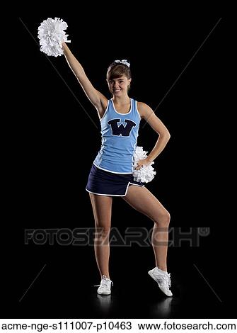 Studio shot of cheerleader (16-17) striking pose View Large Photo Image Stock Image - Studio shot of cheerleader (16-17) striking pose. Fotosearch