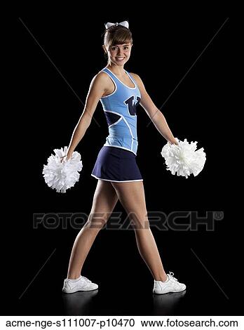 Studio shot of cheerleader (16-17) striking pose View Large Photo Image Stock Image - Studio shot of cheerleader (16-17) striking pose. Fotosearch