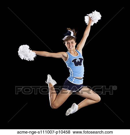 Studio shot of cheerleader (16-17) jumping View Large Photo Image Stock Photo - Studio shot of cheerleader (16-17) jumping. Fotosearch