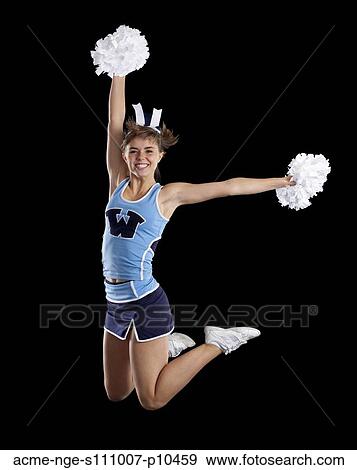 Studio shot of cheerleader (16-17) jumping View Large Photo Image Stock Photo - Studio shot of cheerleader (16-17) jumping. Fotosearch