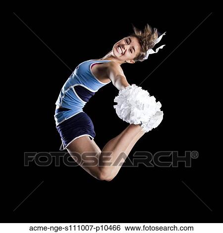Studio shot of cheerleader (16-17) jumping View Large Photo Image Stock Photograph - Studio shot of cheerleader (16-17) jumping. Fotosearch