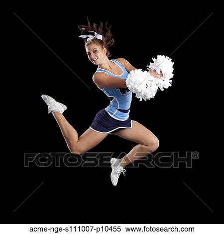 Studio shot of cheerleader (16-17) jumping View Large Photo Image Stock Photography - Studio shot of cheerleader (16-17) jumping. Fotosearch