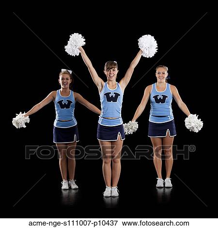 Studio shot of cheerleaders (16-17) dancing View Large Photo Image Stock Photo - Studio shot of cheerleaders (16-17) dancing. Fotosearch