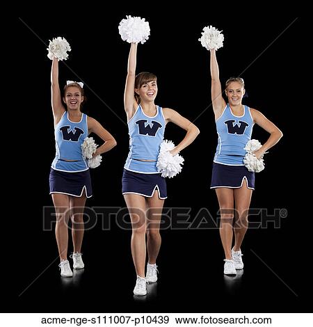 Studio shot of cheerleaders (16-17) dancing View Large Photo Image Stock Photo - Studio shot of cheerleaders (16-17) dancing. Fotosearch