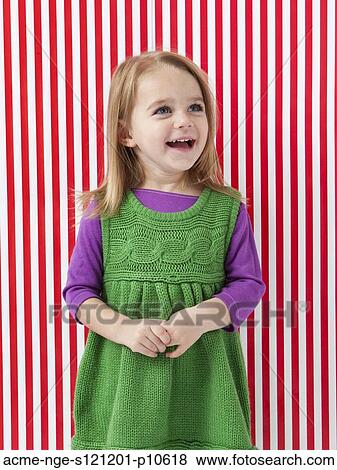 Studio shot of girl (18-23 months) laughing View Large Photo Image Stock Photo - Studio shot of girl (18-23 months) laughing. Fotosearch