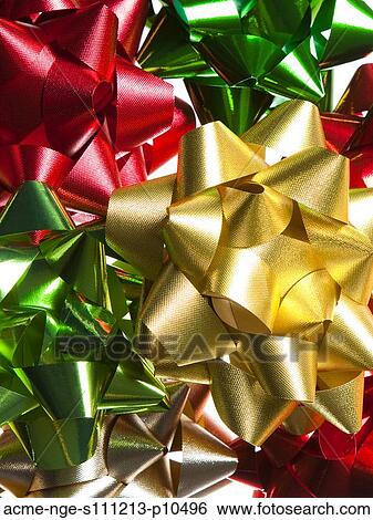 Studio shot of shiny gift bows View Large Photo Image Stock Photograph - Studio shot of shiny gift bows. Fotosearch