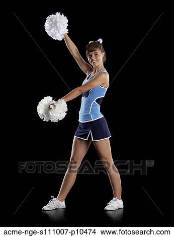 Studio shot of teenage (16-17) cheerleader View Large Photo Image Picture - Studio shot of teenage (16-17) cheerleader. Fotosearch