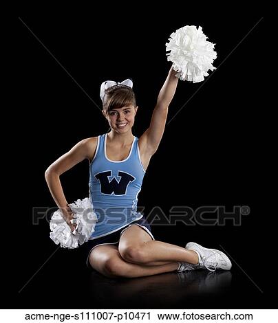 Studio shot of teenage (16-17) cheerleader View Large Photo Image Stock Image - Studio shot of teenage (16-17) cheerleader. Fotosearch