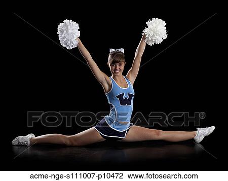 Studio shot of teenage (16-17) cheerleader View Large Photo Image Stock Image - Studio shot of teenage (16-17) cheerleader. Fotosearch