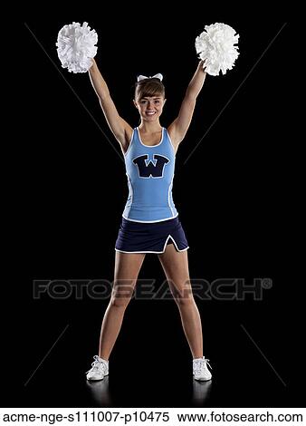 Studio shot of teenage (16-17) cheerleader View Large Photo Image Stock Photography - Studio shot of teenage (16-17) cheerleader. Fotosearch