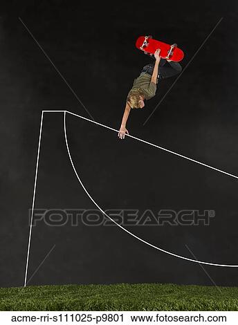 Teenage boy (14-15) skateboarding in half pipe View Large Photo Image Stock Image - Teenage boy (14-15) skateboarding in half pipe. Fotosearch