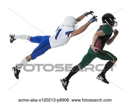 Two male players of American football fighting for ball, studio shot View Large Photo Image Stock Photograph - Two male players of American football fighting for ball, studio shot. Fotosearch