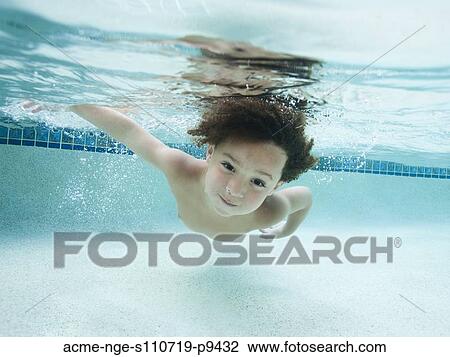 USA, Utah, Orem, Boy (4-5) swimming in swimming pool View Large Photo Image Stock Image - USA, Utah, Orem, Boy (4-5) swimming in swimming pool. Fotosearch