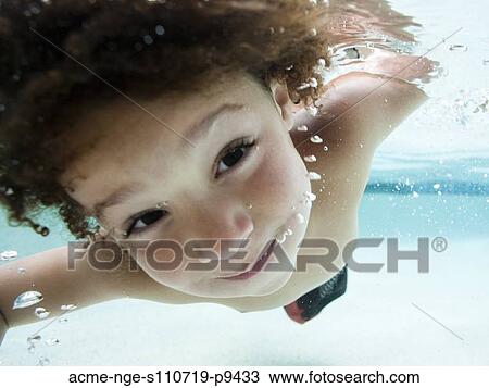 USA, Utah, Orem, Boy (4-5) swimming in swimming pool View Large Photo Image Stock Image - USA, Utah, Orem, Boy (4-5) swimming in swimming pool. Fotosearch