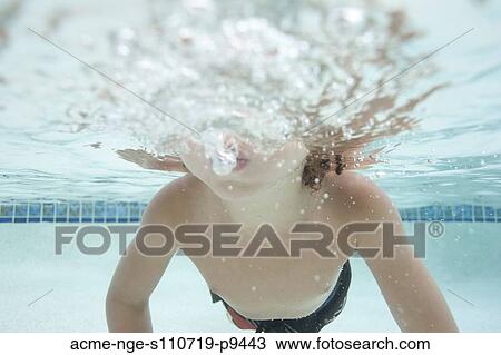 USA, Utah, Orem, Boy (4-5) swimming in pool View Large Photo Image Stock Image - USA, Utah, Orem, Boy (4-5) swimming in pool. Fotosearch