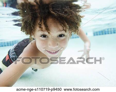 USA, Utah, Orem, Boy (4-5) swimming in pool View Large Photo Image Stock Image - USA, Utah, Orem, Boy (4-5) swimming in pool. Fotosearch