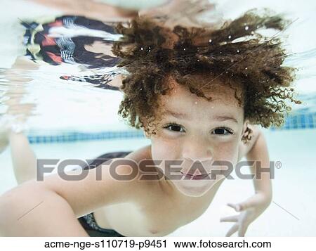 USA, Utah, Orem, Boy (4-5) swimming in pool View Large Photo Image Stock Image - USA, Utah, Orem, Boy (4-5) swimming in pool. Fotosearch