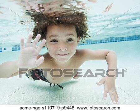 USA, Utah, Orem, Boy (4-5) swimming in pool View Large Photo Image Stock Photo - USA, Utah, Orem, Boy (4-5) swimming in pool. Fotosearch