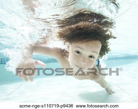 USA, Utah, Orem, Boy (4-5) swimming in pool View Large Photo Image Stock Photograph - USA, Utah, Orem, Boy (4-5) swimming in pool. Fotosearch