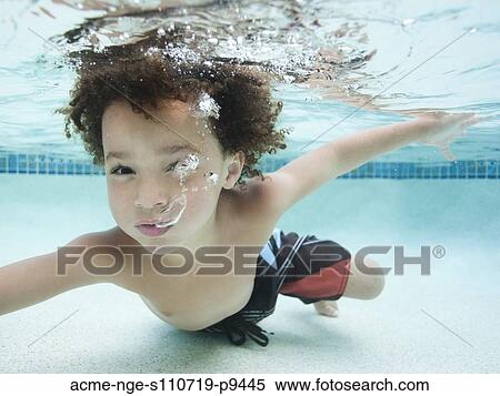 USA, Utah, Orem, Boy (4-5) swimming in pool View Large Photo Image Stock Photography - USA, Utah, Orem, Boy (4-5) swimming in pool. Fotosearch