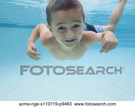 USA, Utah, Orem, Boy (6-7) swimming in pool View Large Photo Image Stock Image - USA, Utah, Orem, Boy (6-7) swimming in pool. Fotosearch