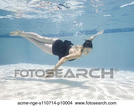 USA, Utah, Orem, Female ballet dancer under water View Large Photo Image Picture - USA, Utah, Orem, Female ballet dancer under water. Fotosearch