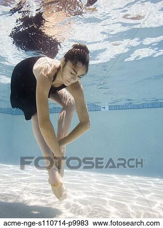 USA, Utah, Orem, Female ballet dancer under water View Large Photo Image Stock Image - USA, Utah, Orem, Female ballet dancer under water. Fotosearch