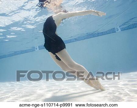 Stock Image - USA, Utah, Orem, Female ballet dancer under water. Fotosearch