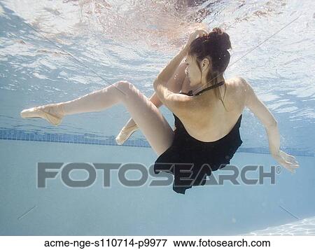 USA, Utah, Orem, Female ballet dancer under water View Large Photo Image Stock Photo - USA, Utah, Orem, Female ballet dancer under water. Fotosearch