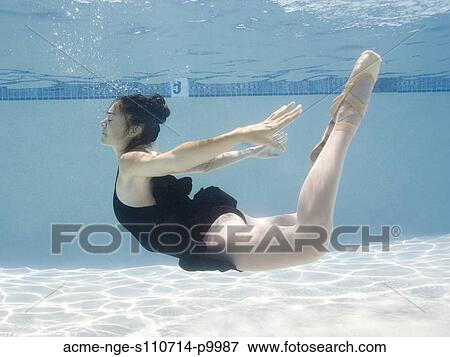 Stock Photo - USA, Utah, Orem, Female ballet dancer under water. Fotosearch