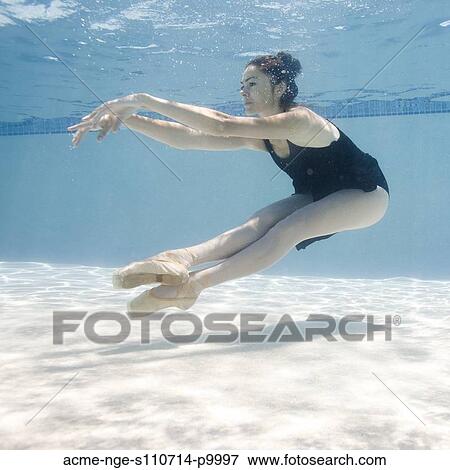 USA, Utah, Orem, Female ballet dancer under water View Large Photo Image Stock Photo - USA, Utah, Orem, Female ballet dancer under water. Fotosearch