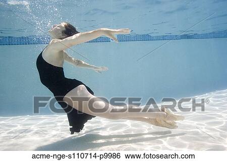 USA, Utah, Orem, Female ballet dancer under water View Large Photo Image Stock Photograph - USA, Utah, Orem, Female ballet dancer under water. Fotosearch