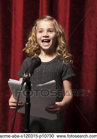 USA, Utah, Orem, Portrait of girl (8-9) singing with microphone View Large Photo Image Stock Image - USA, Utah, Orem, Portrait of girl (8-9) singing with microphone. Fotosearch