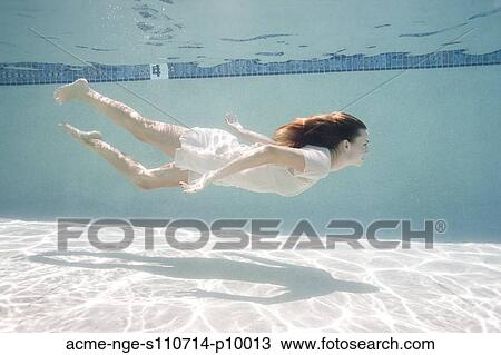 USA, Utah, Orem, Portrait of young woman under water View Large Photo Image Stock Image - USA, Utah, Orem, Portrait of young woman under water. Fotosearch