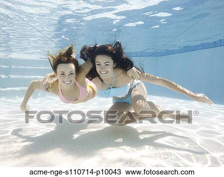USA, Utah, Orem, Portrait of young women under water View Large Photo Image Stock Image - USA, Utah, Orem, Portrait of young women under water. Fotosearch