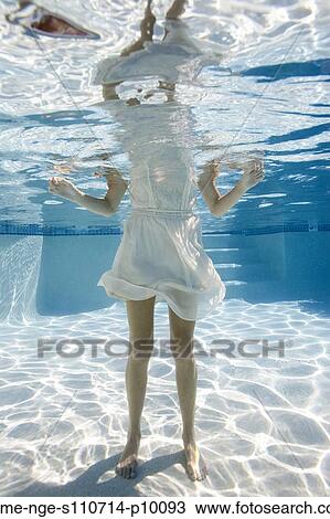 USA, Utah, Orem, Young woman in pool ballet dancing View Large Photo Image Stock Image - USA, Utah, Orem, Young woman in pool ballet dancing. Fotosearch