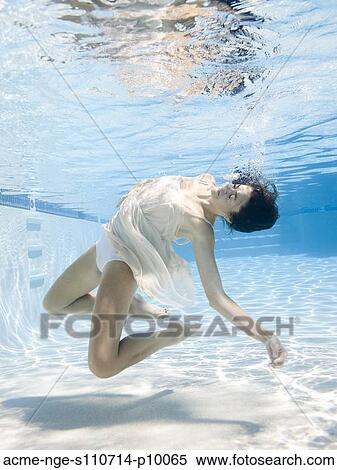 USA, Utah, Orem, Young woman in pool ballet dancing View Large Photo Image Stock Photography - USA, Utah, Orem, Young woman in pool ballet dancing. Fotosearch