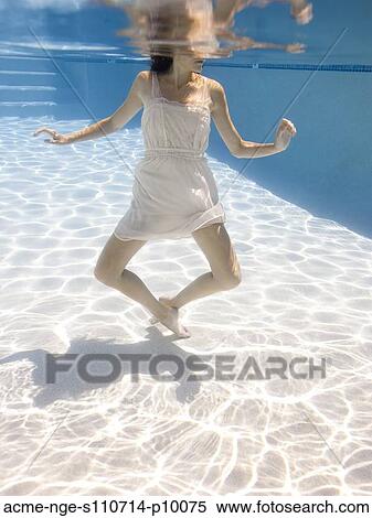 USA, Utah, Orem, Young woman in pool ballet dancing View Large Photo Image Stock Photography - USA, Utah, Orem, Young woman in pool ballet dancing. Fotosearch